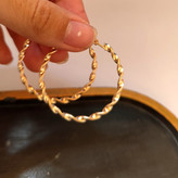 گوشواره حلقه ای پیج پیجی طلایی